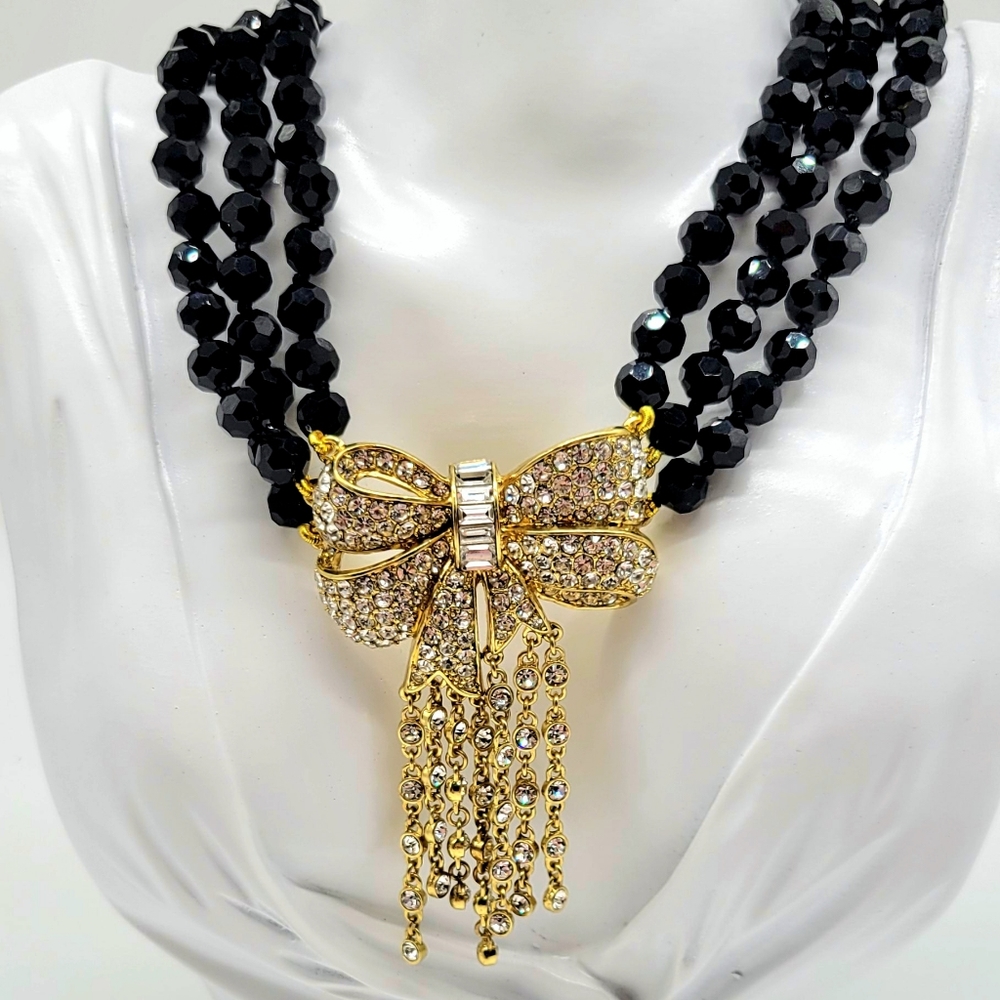 Heidi Daus Swarovski Crystal Bow Statement Necklace with Chainmail Fringe